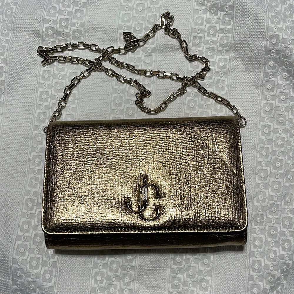 Jimmy Choo golden clutch.